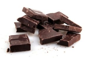 Pile of Chocolate chunks isolated against a white background